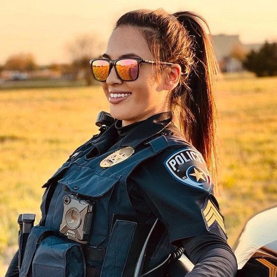 Police man wearing nado sunset sunglasses
